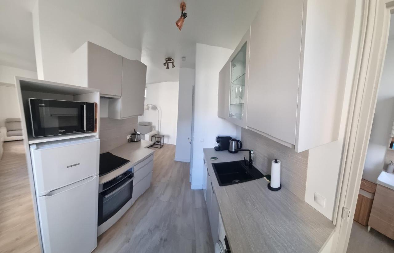 Appartement Luxueux Dans Maison Bourgeoise Parisienne ルヴァロワ＝ペレ エクステリア 写真